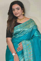Staring Firozi Soft Banarasi Silk Saree With Jazzy Blouse Piece