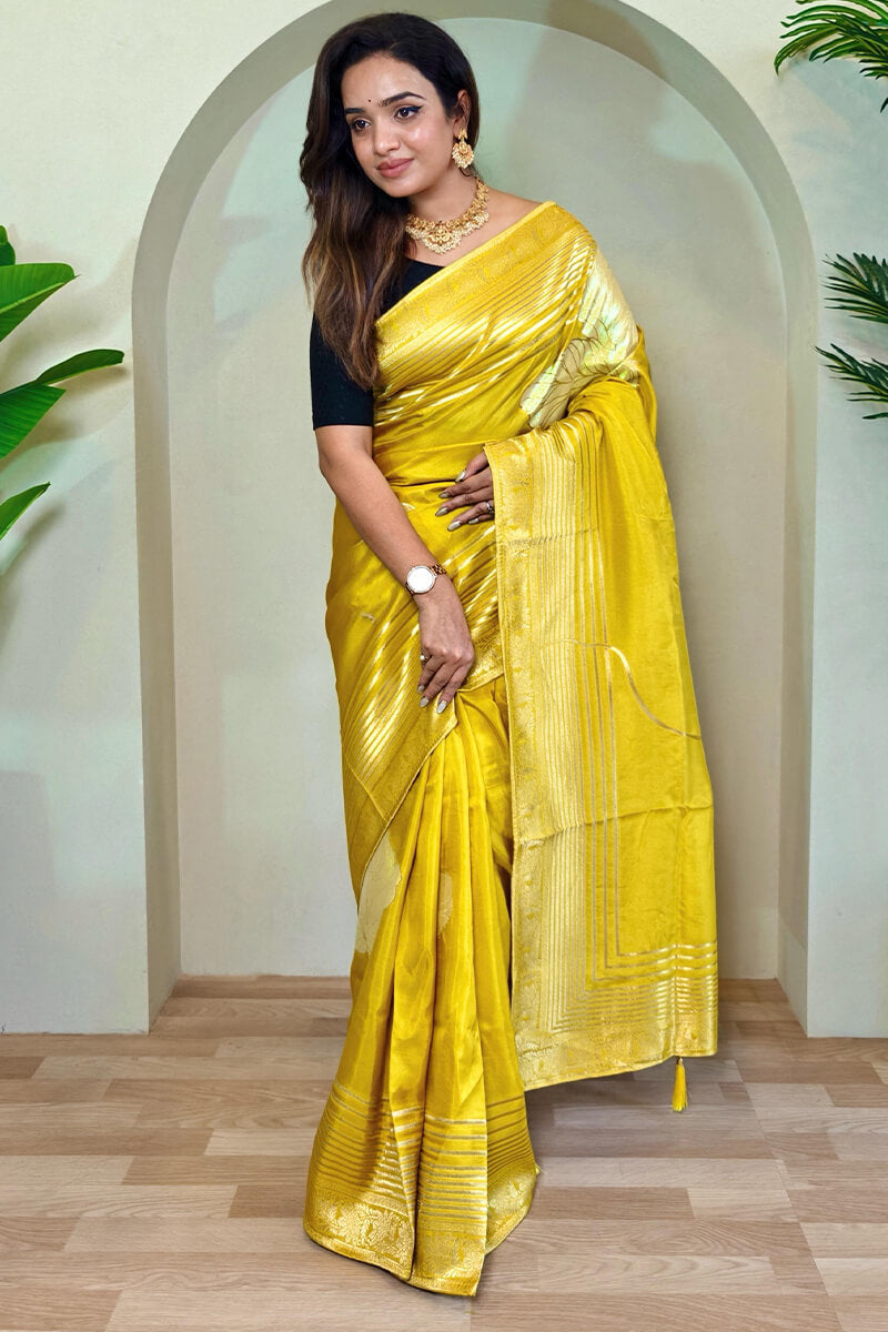 Captivating Mustard Soft Banarasi Silk Saree With Blissful Blouse Piece