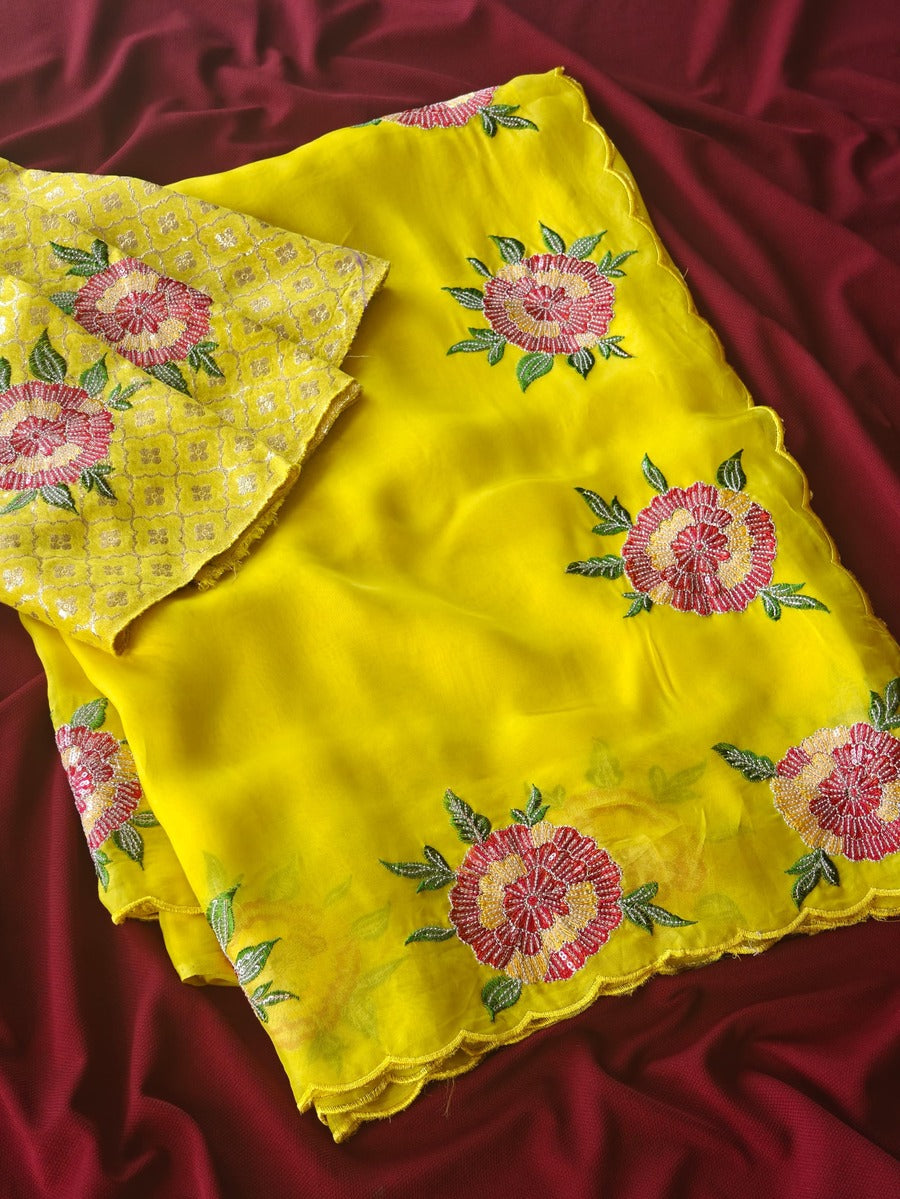 Prodigal Yellow Embroidery Work Organza Silk Saree With Eloquence Blouse Piece