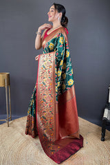 Adorning Dark Green Patola Silk Saree with Deserving Blouse Piece