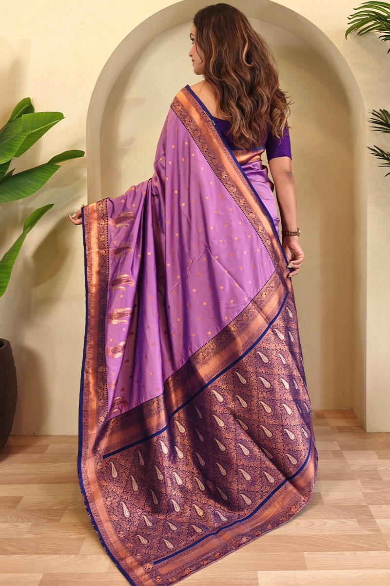 Tempting Lavender Soft Banarasi Silk Saree With Staggering Blouse Piece