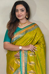 Lissome Mehndi Soft Banarasi Silk Saree With Effervescent Blouse Piece