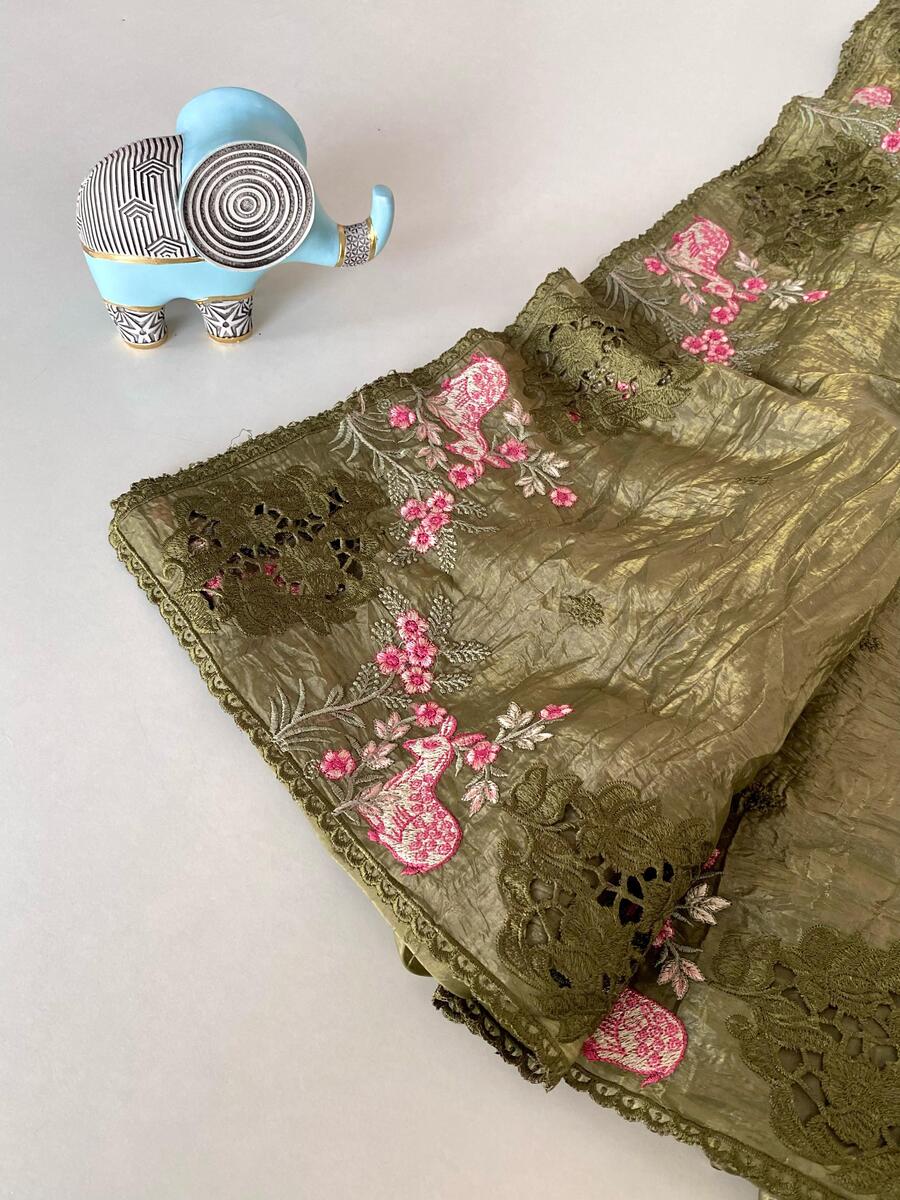 Refreshing Green Embroidery Work Crush Silk Saree With Eloquence Blouse Piece