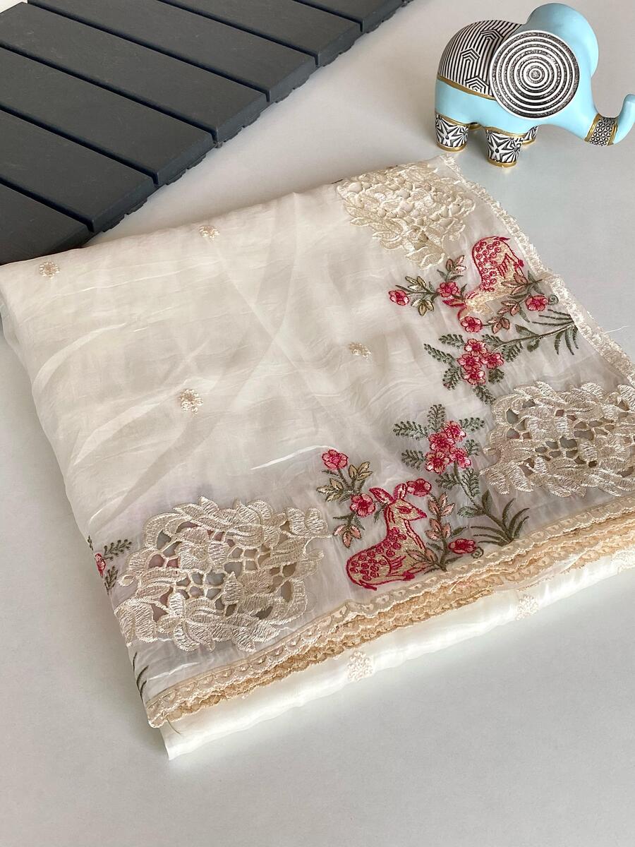 Surreptitious Off White Embroidery Work Crush Silk Saree With Jubilant Blouse Piece