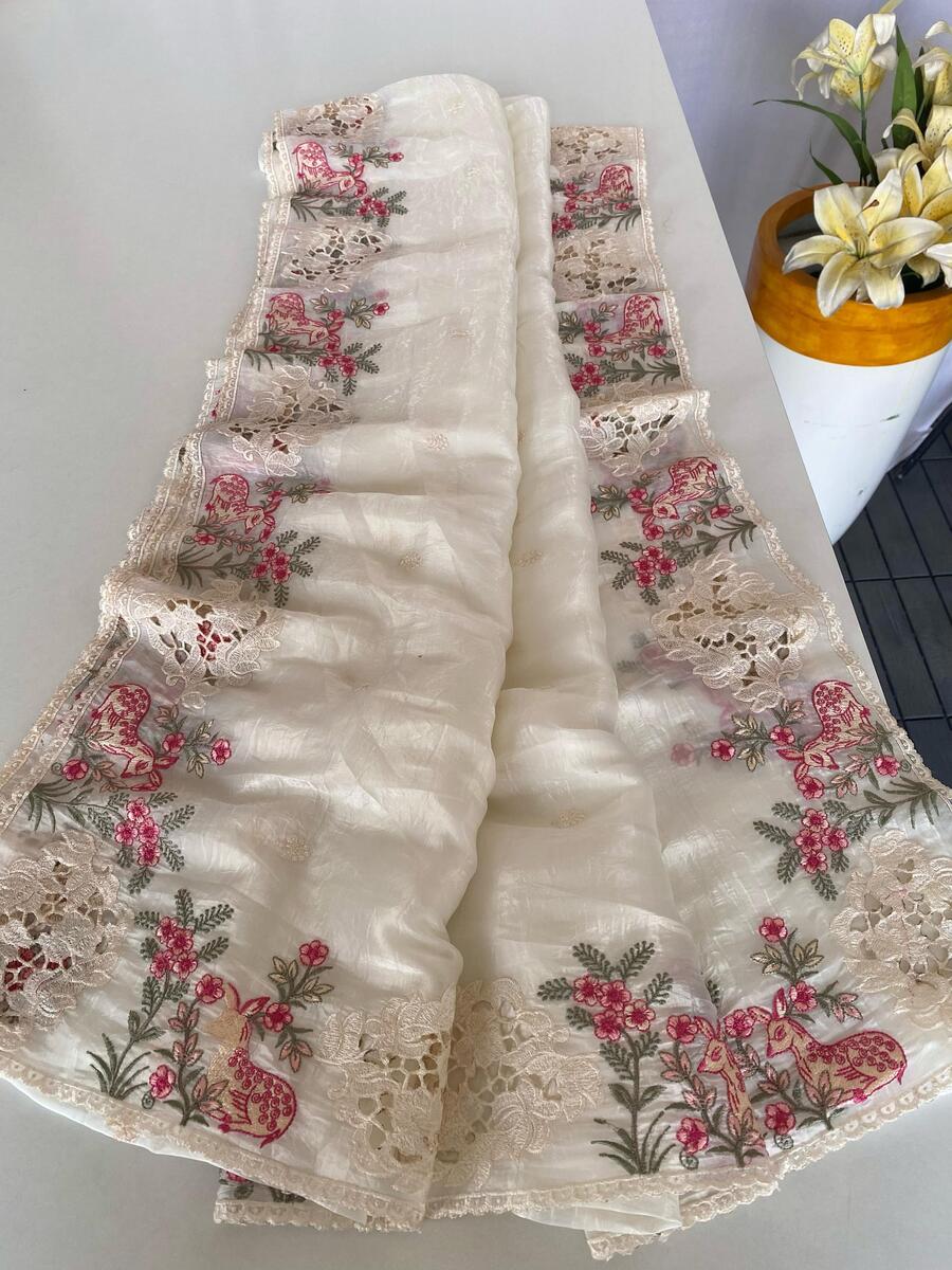 Surreptitious Off White Embroidery Work Crush Silk Saree With Jubilant Blouse Piece