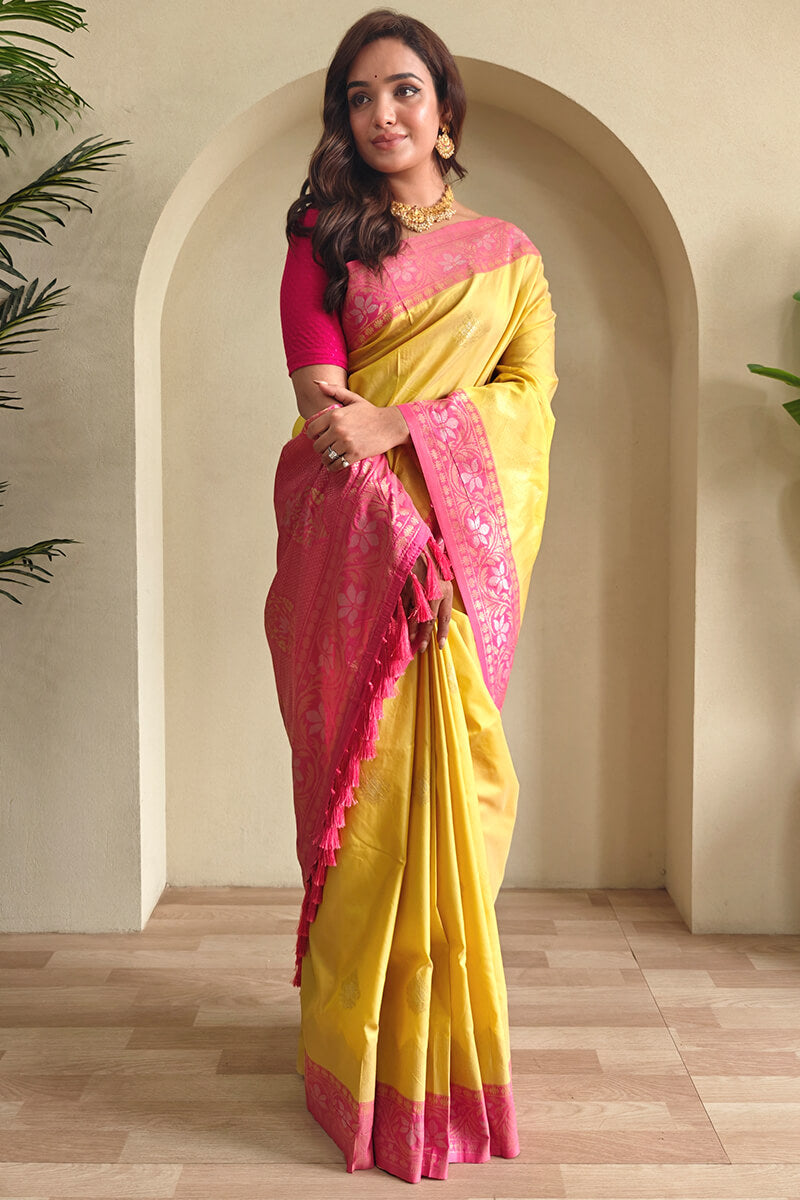 Incomparable Yellow Soft Banarasi Silk Saree With Seraphic Blouse Piece