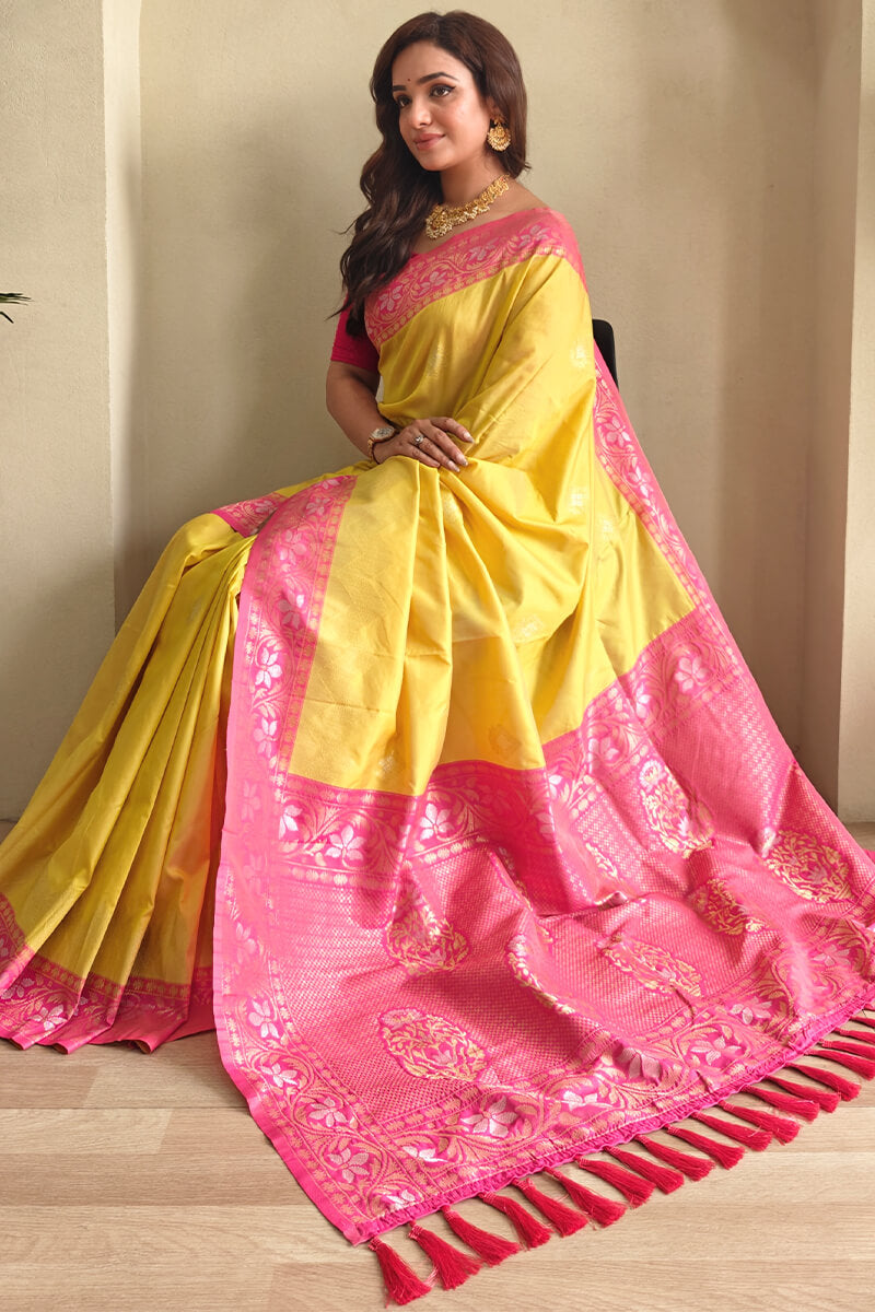 Incomparable Yellow Soft Banarasi Silk Saree With Seraphic Blouse Piece