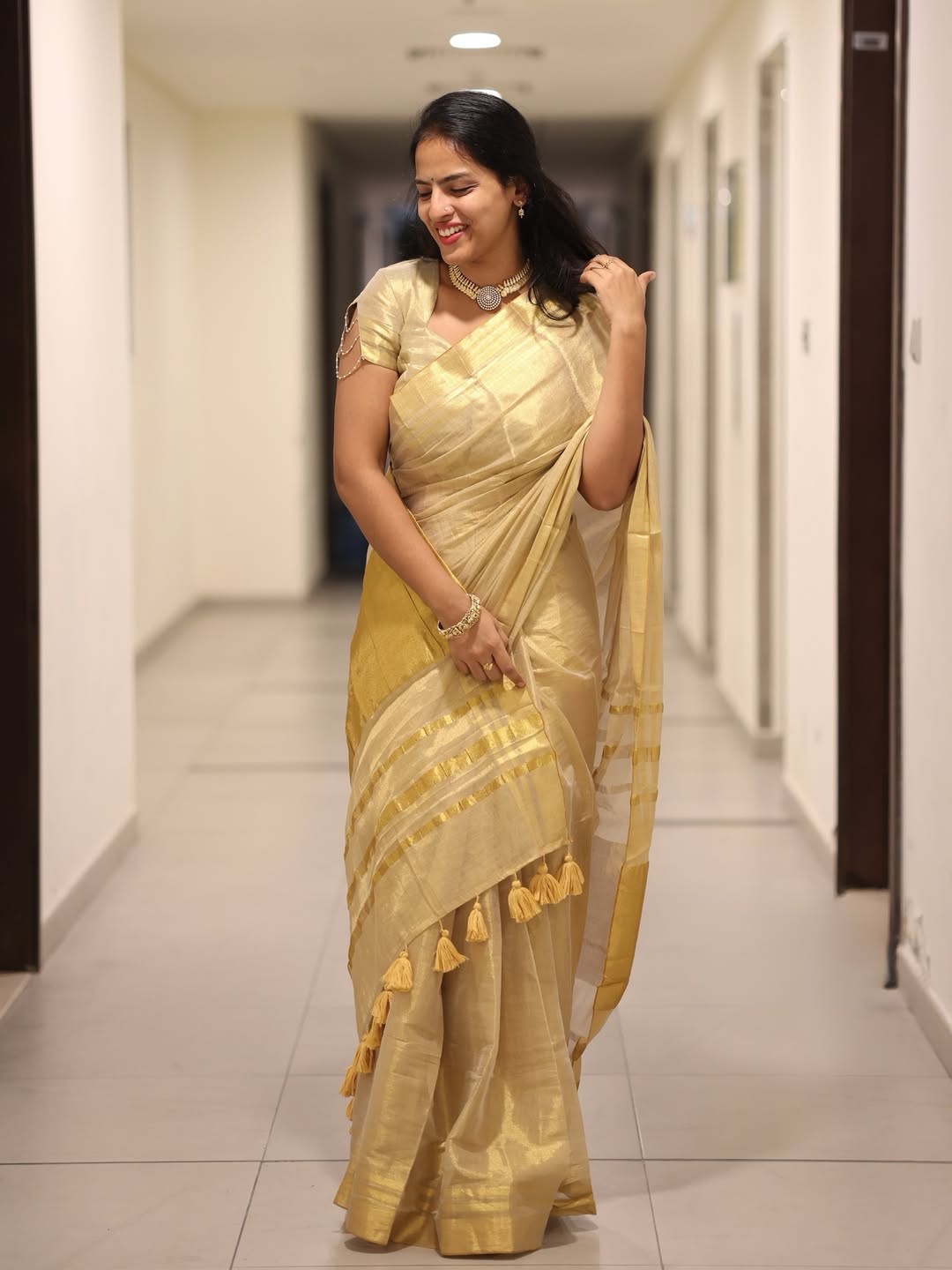 Luxury off white gold kasavu saree with designer tassel pallu mameraa
