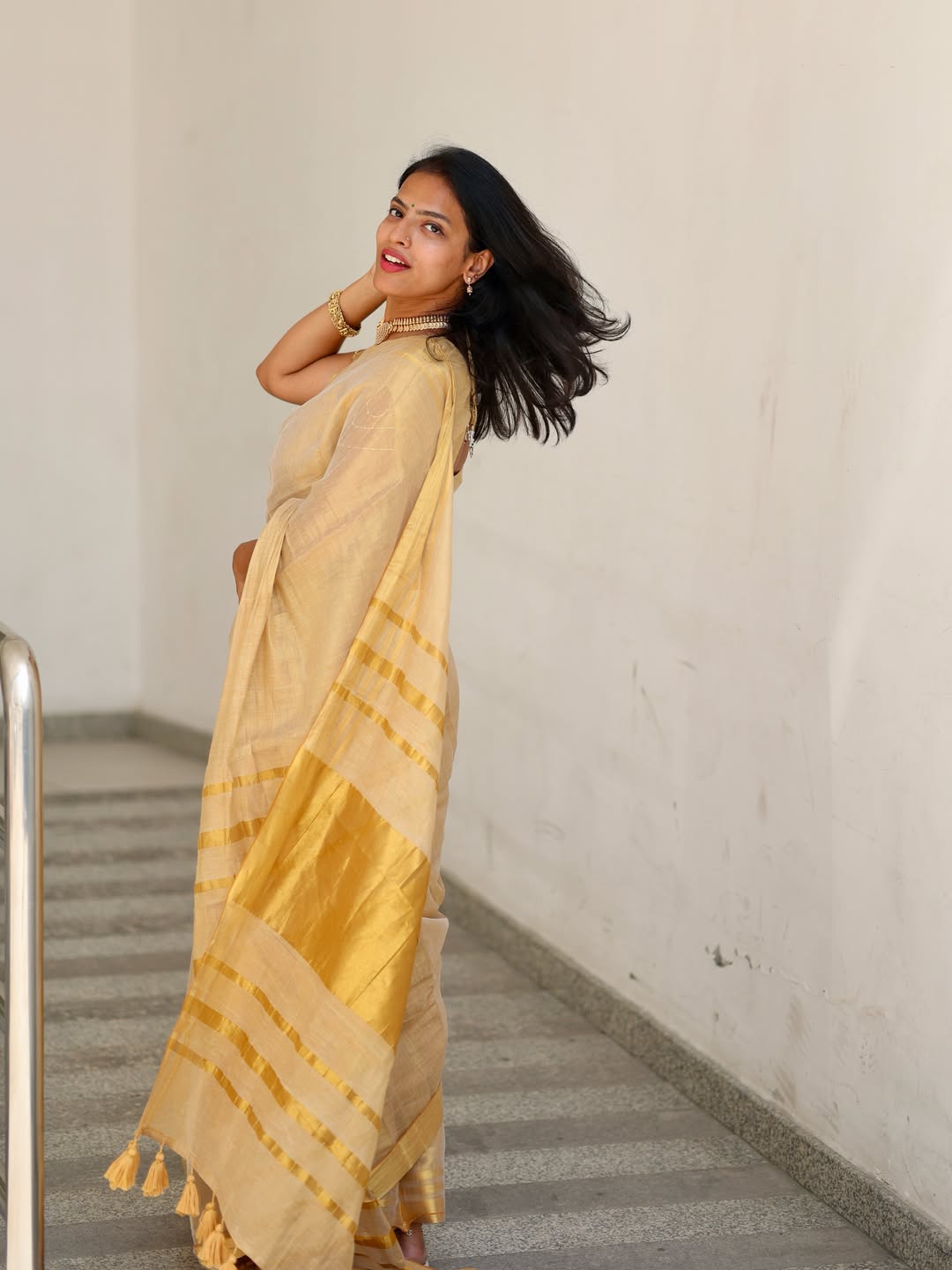 Luxury off white gold kasavu saree with designer tassel pallu