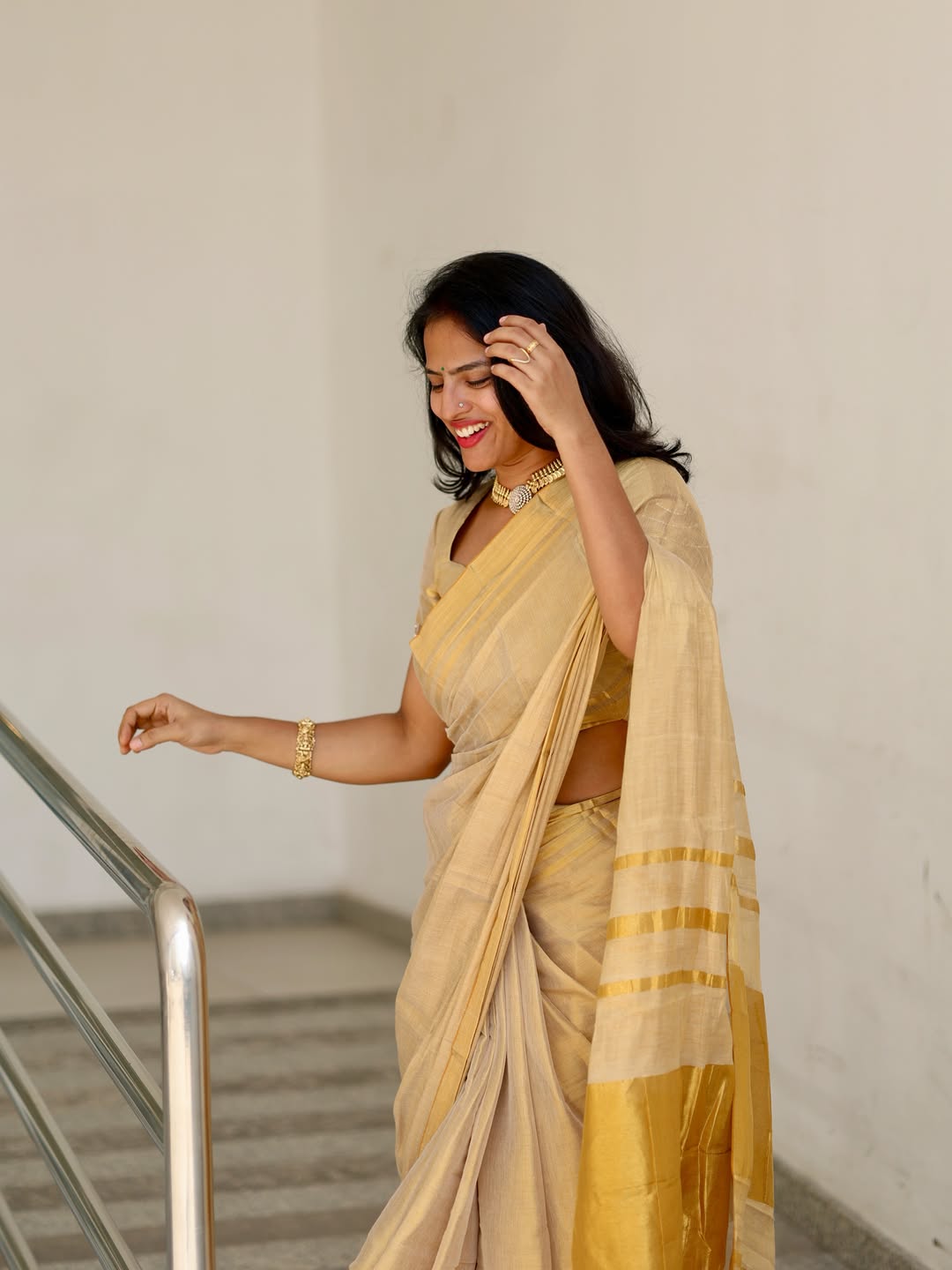 Luxury off white gold kasavu saree with designer tassel pallu