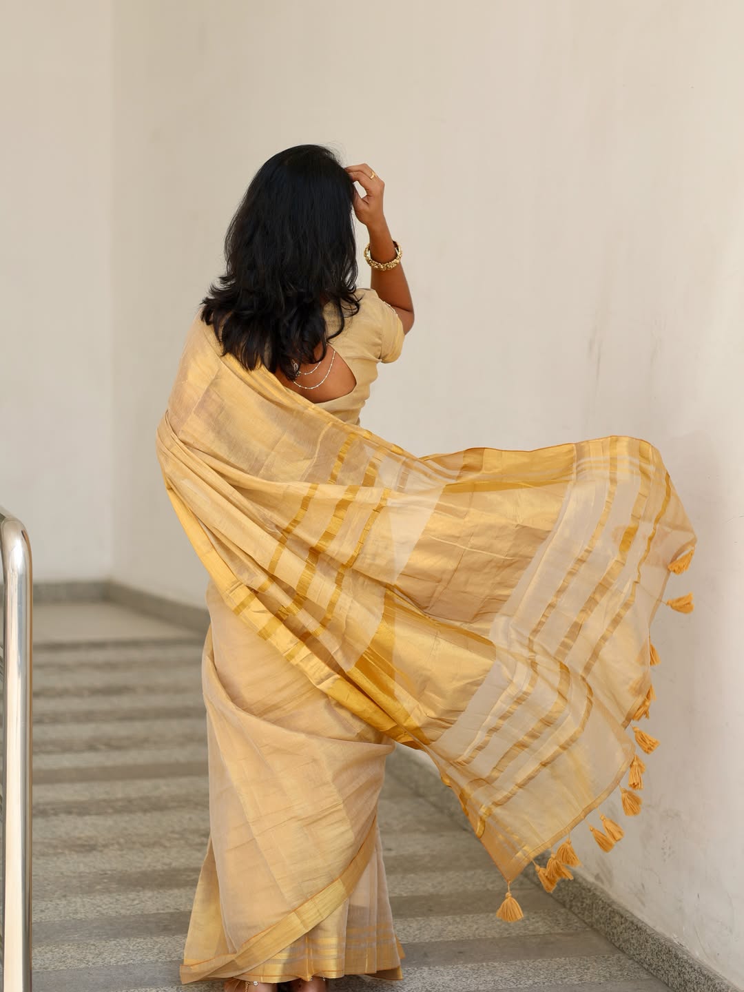 Luxury off white gold kasavu saree with designer tassel pallu