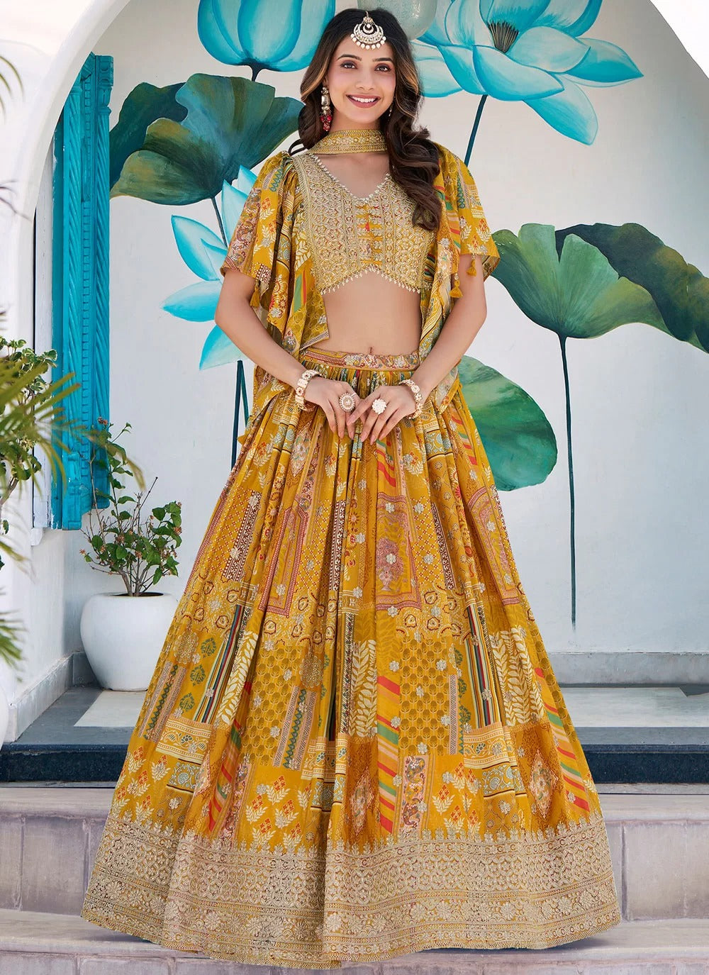 Trendy yellow chinnon silk embroidered lehenga choli with chiffon dupatta for women