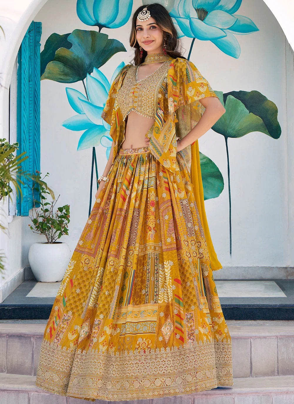 Trendy yellow chinnon silk embroidered lehenga choli with chiffon dupatta for women