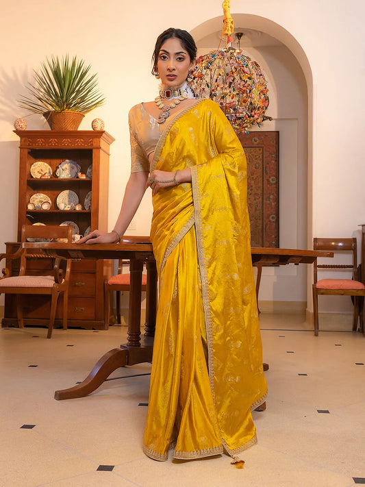 Yellow Satin Silk Party Wear Saree with Zari Motifs and Embroidered Work