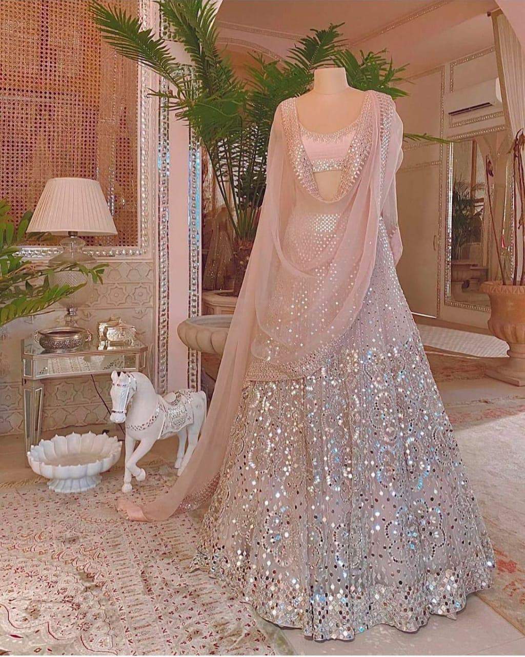 Heavy Lehenga Choli in Organza Silk Fabrics and Light Peach Color