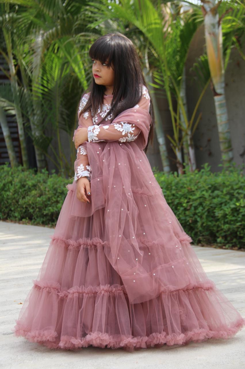 Admiring Peach Color Kids Ruffle Style Gown