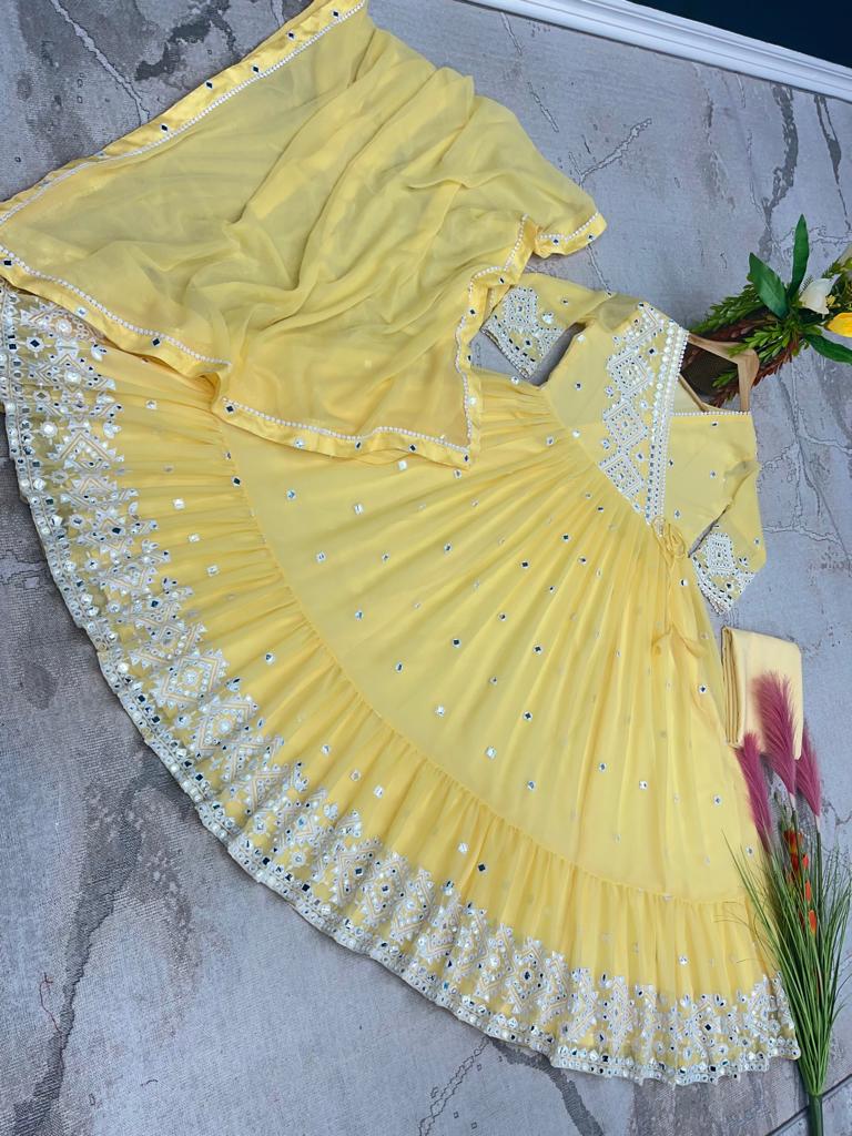Yellow Color Heavy Embroidery Work Ruffle Style Gown