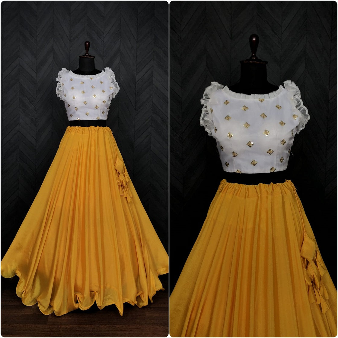 Party Wear Yellow Color Sleeveless Lehenga With Blouse