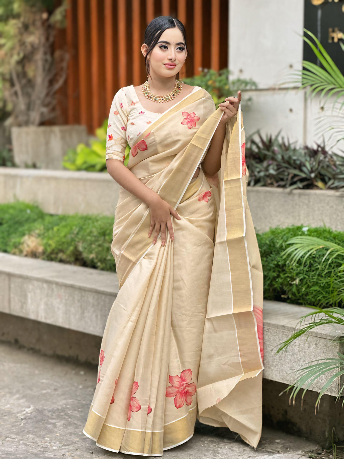 Elegant beige floral print gold tissue silk saree for women traditional indian attire with pink blossom design