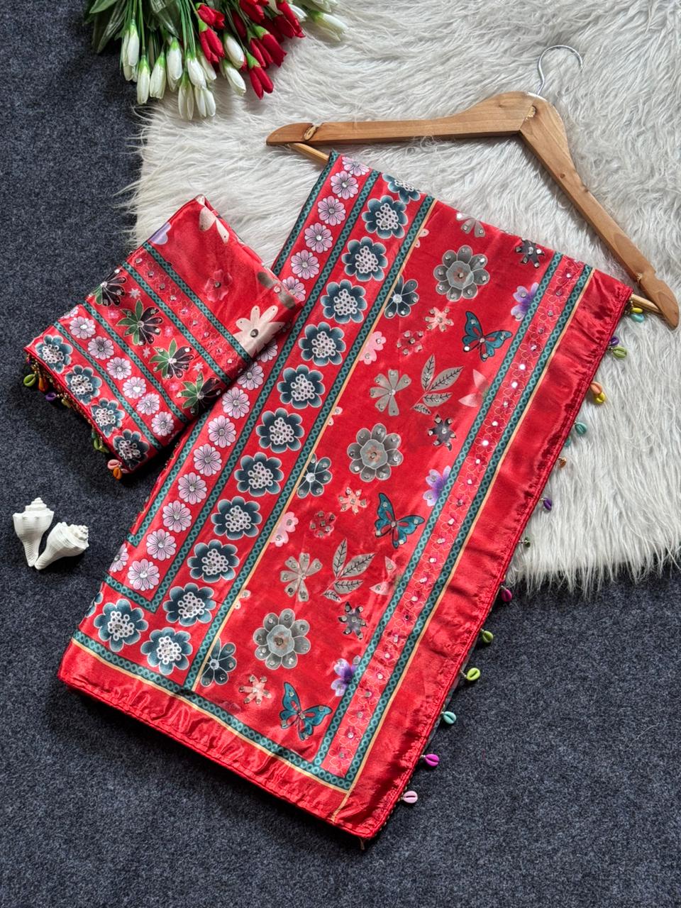 Burnt orange mirror work silk saree with floral ethnic design