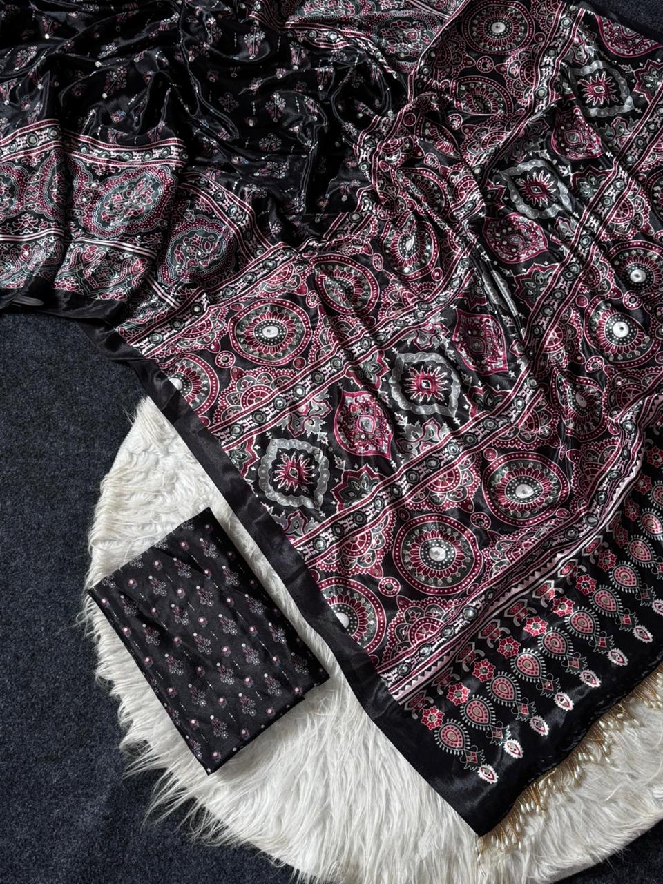 Black modal silk ajrakh printed saree with heritage medallion motifs rich traditional pallu tassel detailing