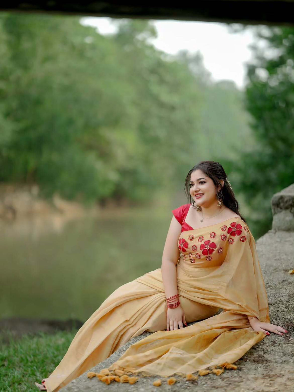 Golden tissue handwork saree with designer floral blouse