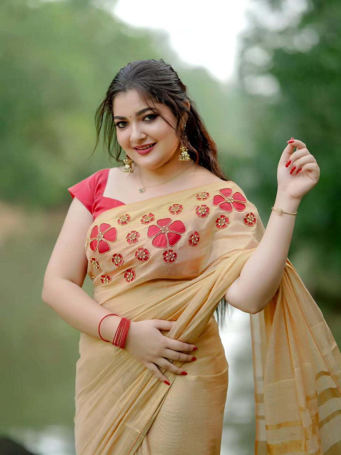 Golden tissue handwork saree with designer floral blouse