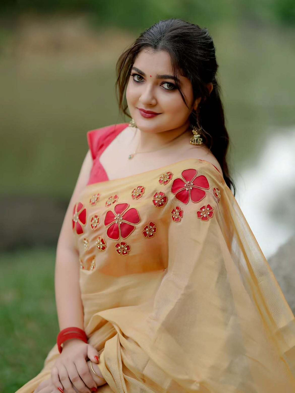 Golden tissue handwork saree with designer floral blouse