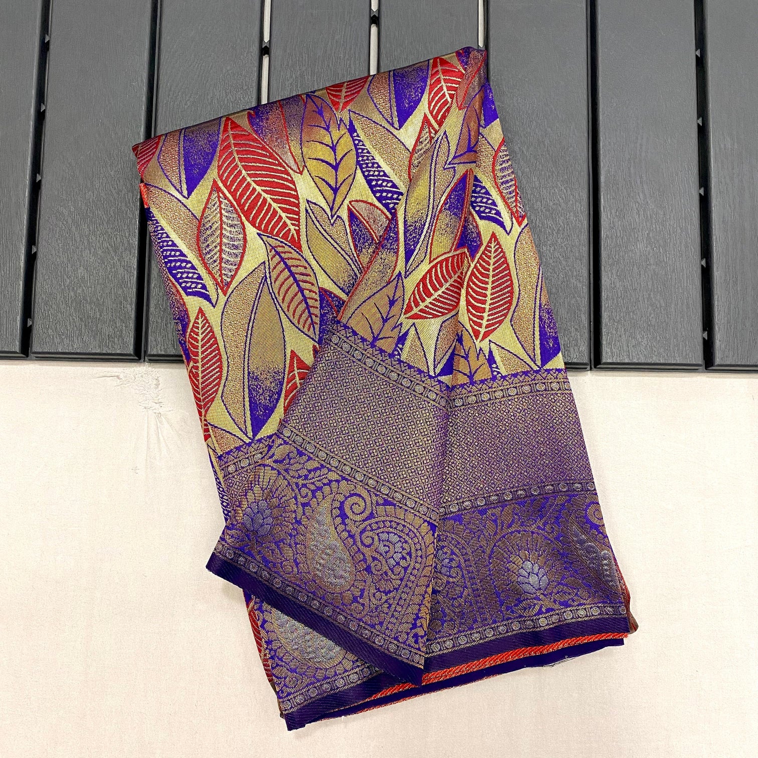 Royal blue kanchipattu silk saree with all over weaves contrast border