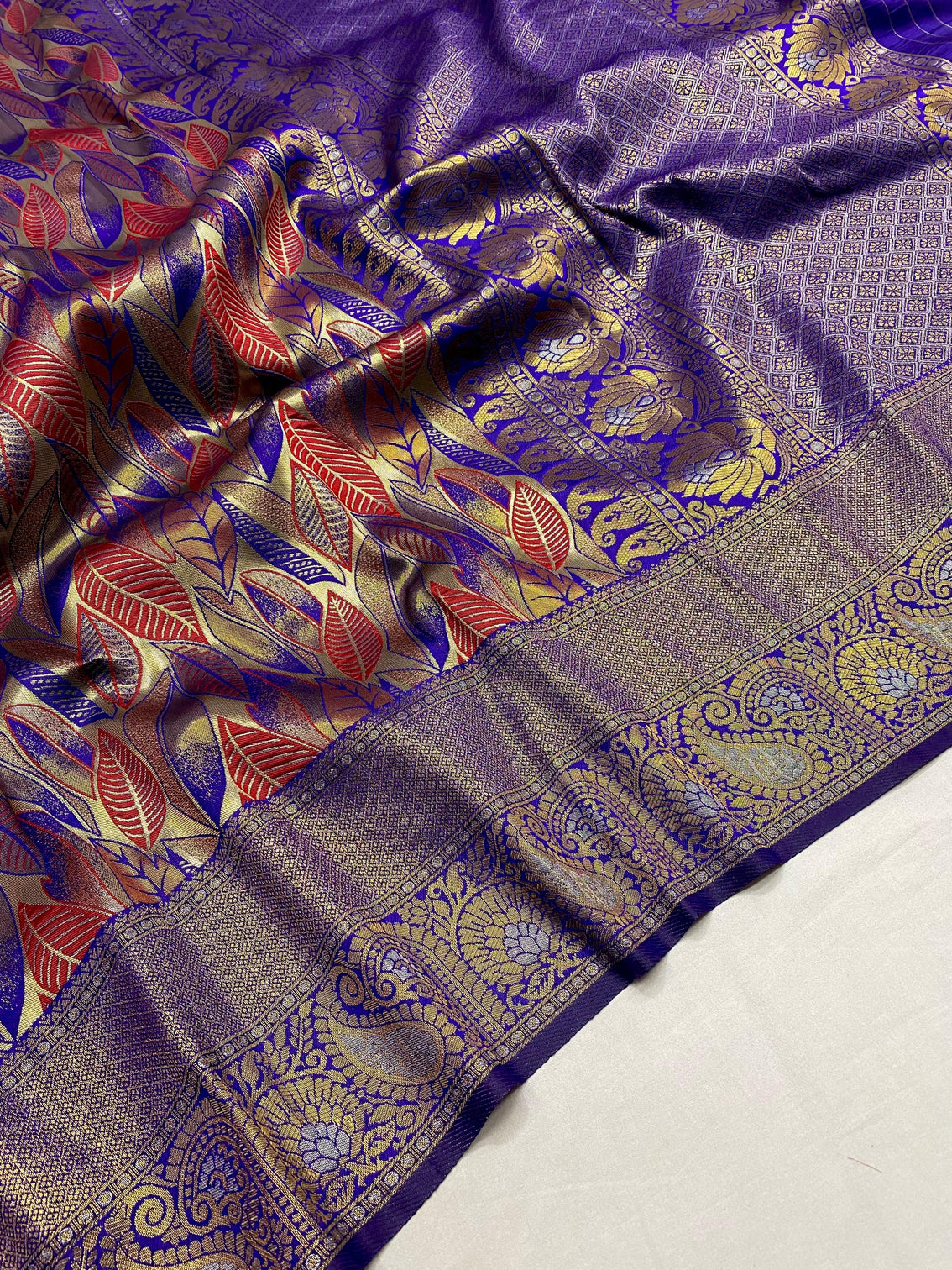 Royal blue kanchipattu silk saree with all over weaves contrast border