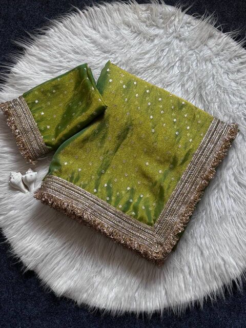 Graceful green viscose saree with embroidered lace border