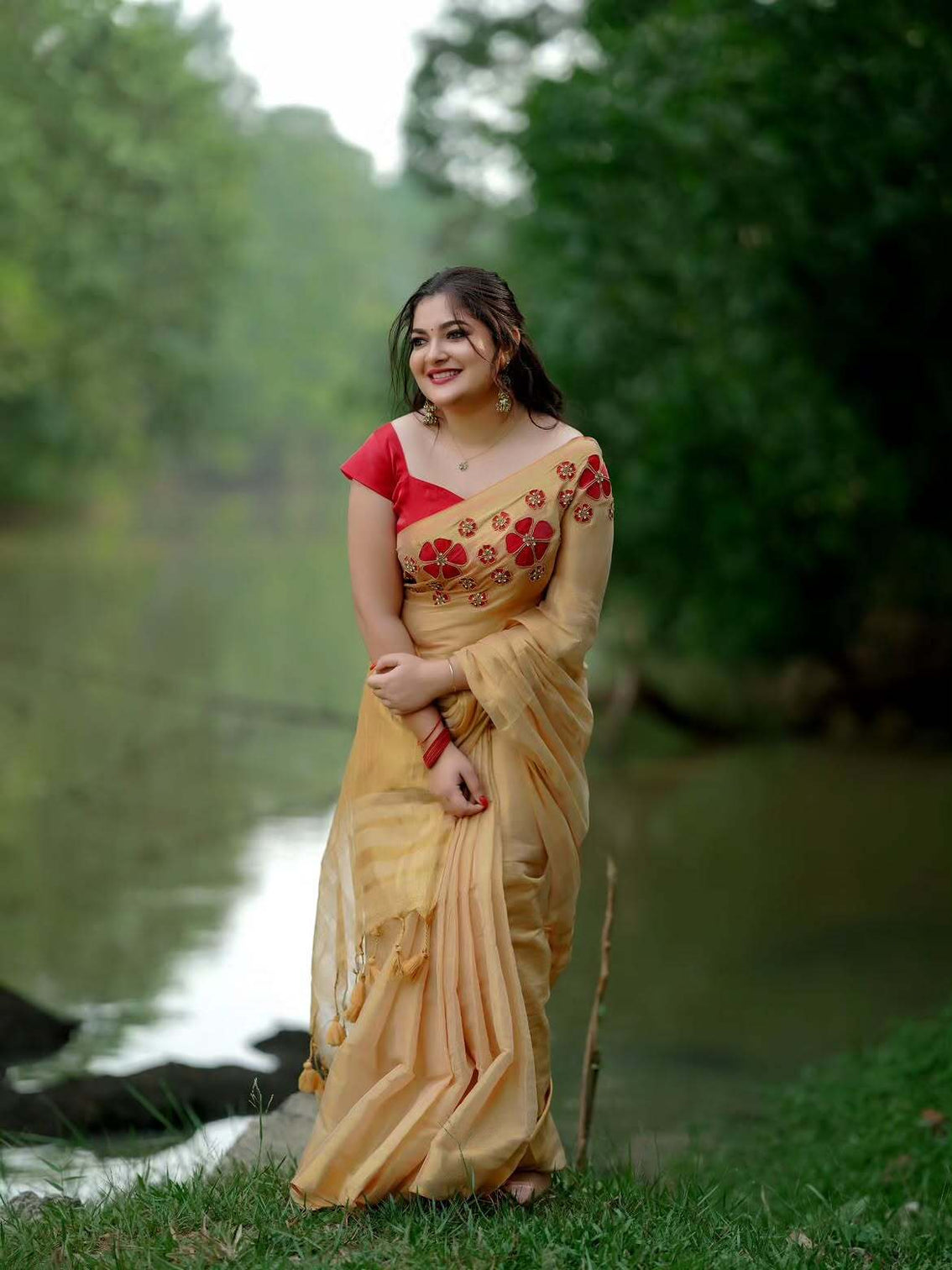 Golden tissue handwork saree with designer floral blouse
