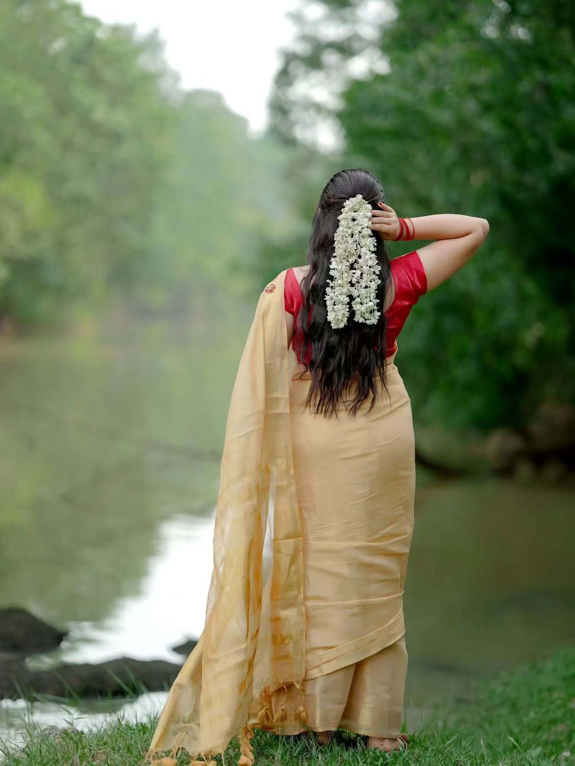 Golden tissue handwork saree with designer floral blouse