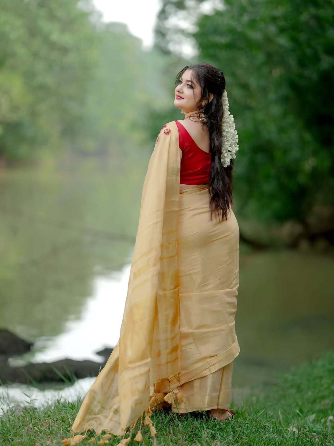 Golden tissue handwork saree with designer floral blouse