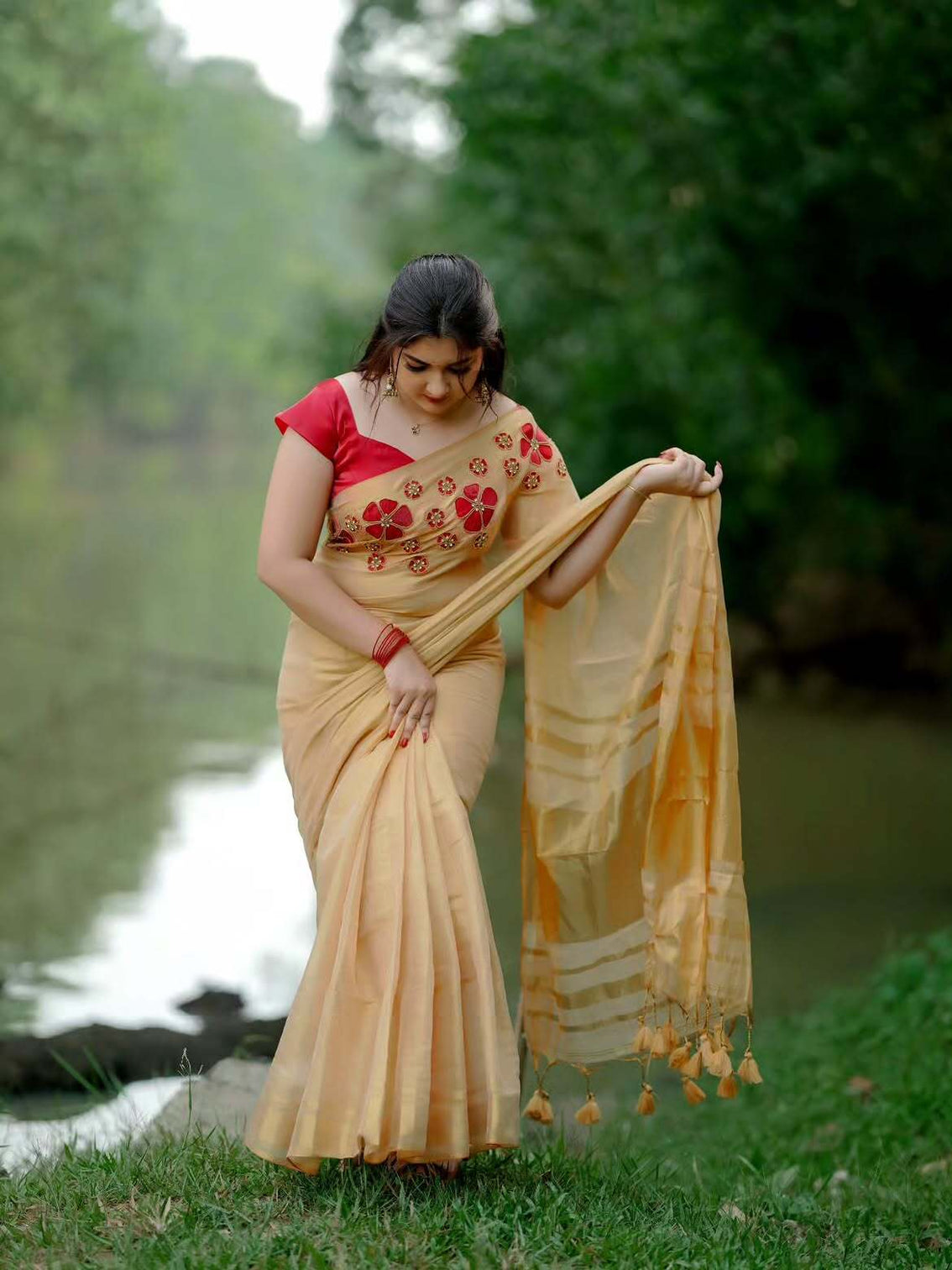 Golden tissue handwork saree with designer floral blouse mameraa
