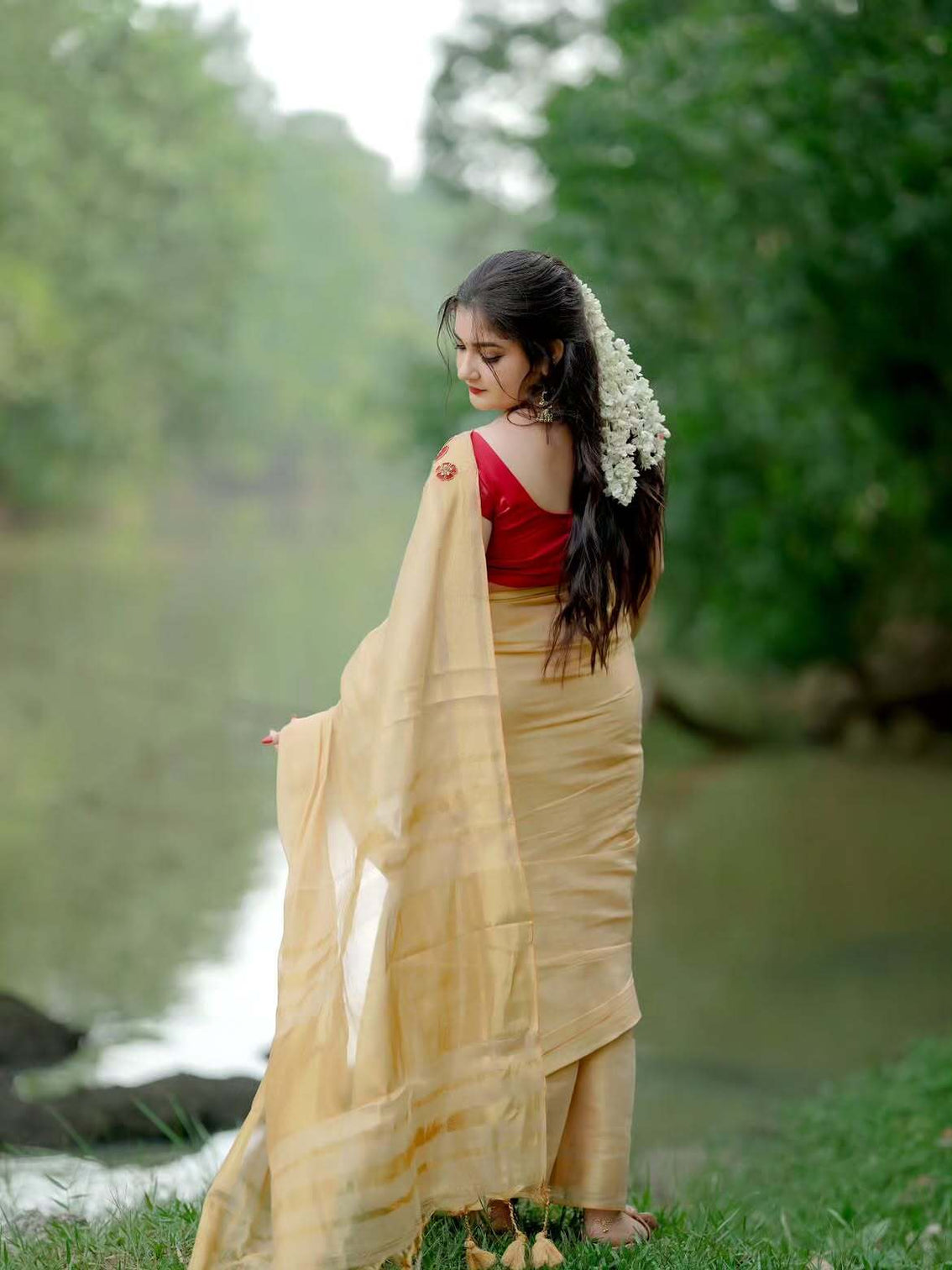 Golden tissue handwork saree with designer floral blouse