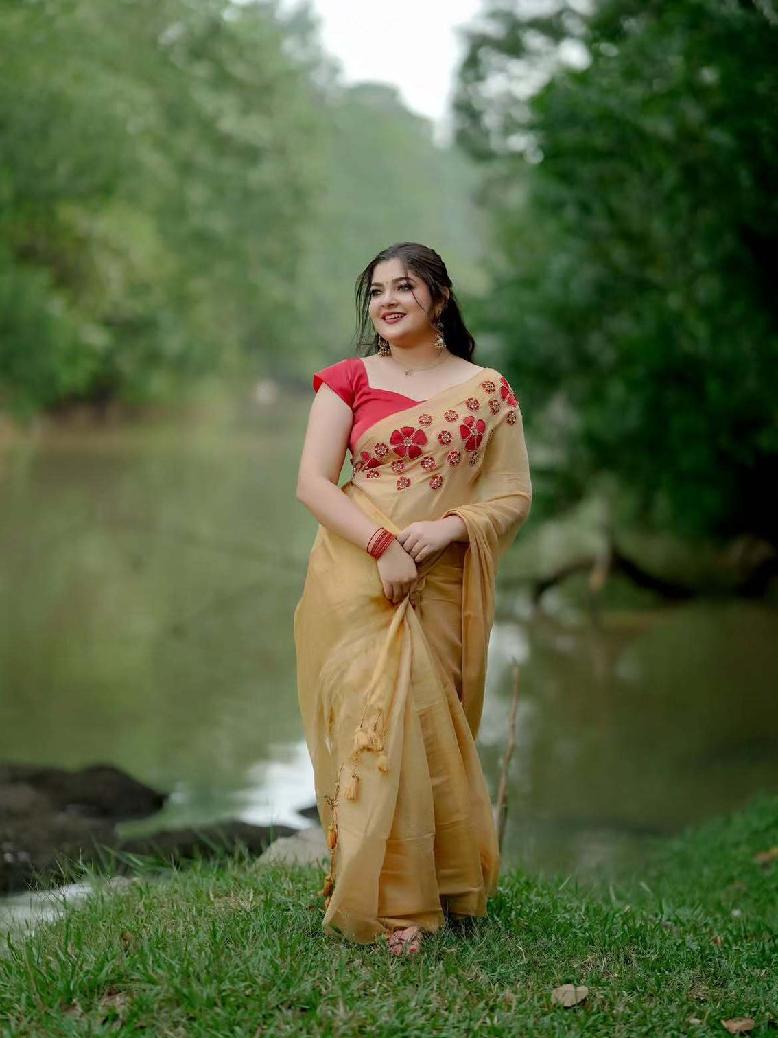 Golden tissue handwork saree with designer floral blouse