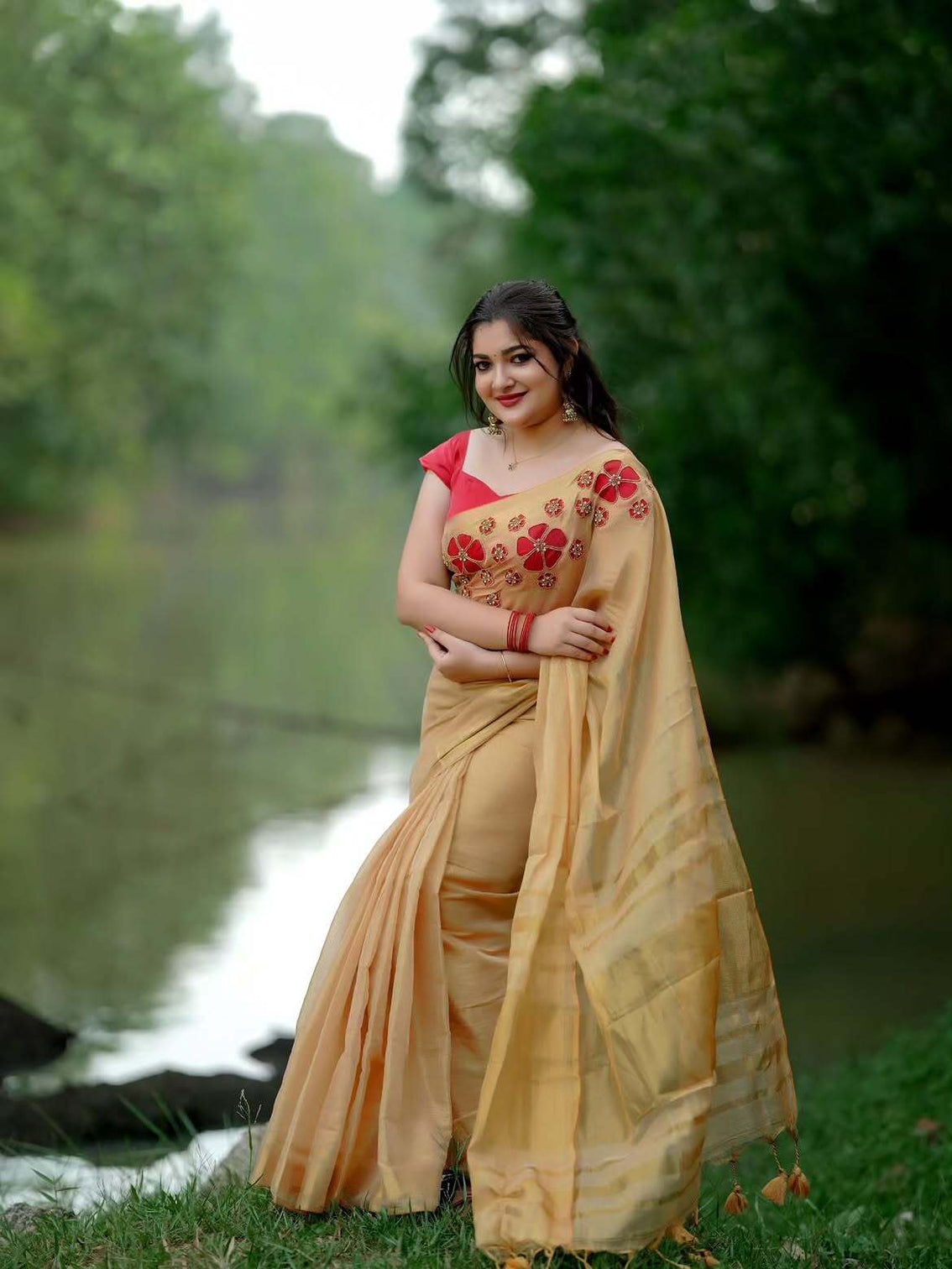 Golden tissue handwork saree with designer floral blouse