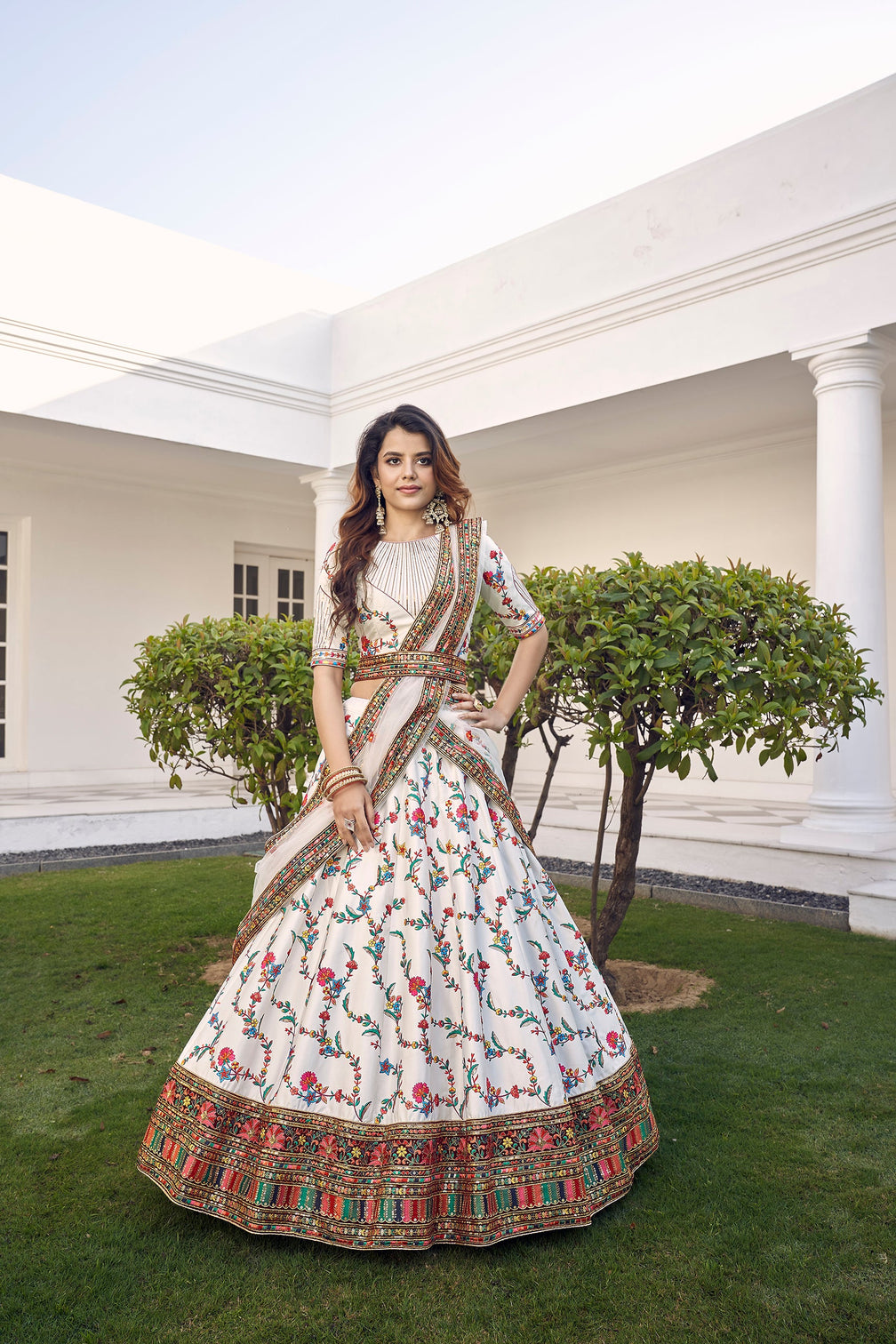 White Silk Embroidered Bridal Reception Heavy Border Lehenga Choli
