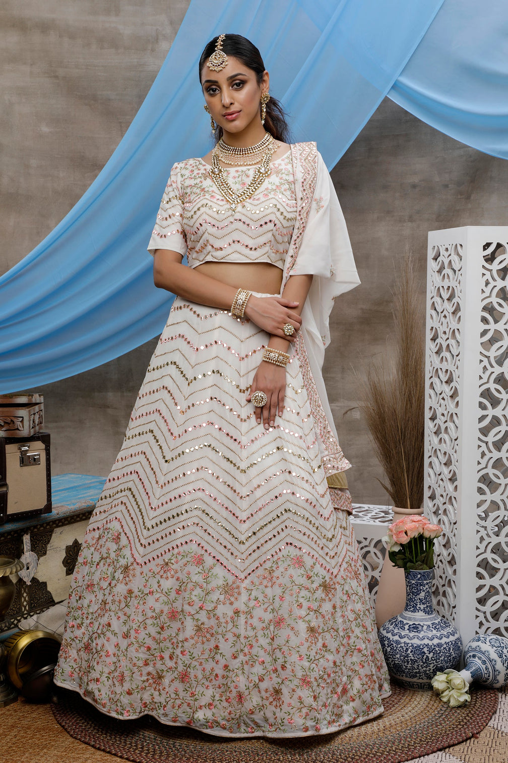White Thread, Sequence And Gota Patti Embroidered Georgette Semi Stitched Bridal Lehenga