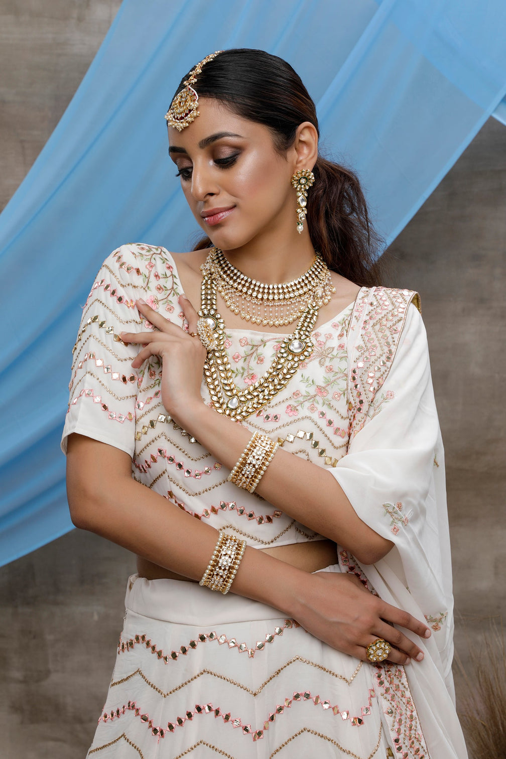 White Thread, Sequence And Gota Patti Embroidered Georgette Semi Stitched Bridal Lehenga