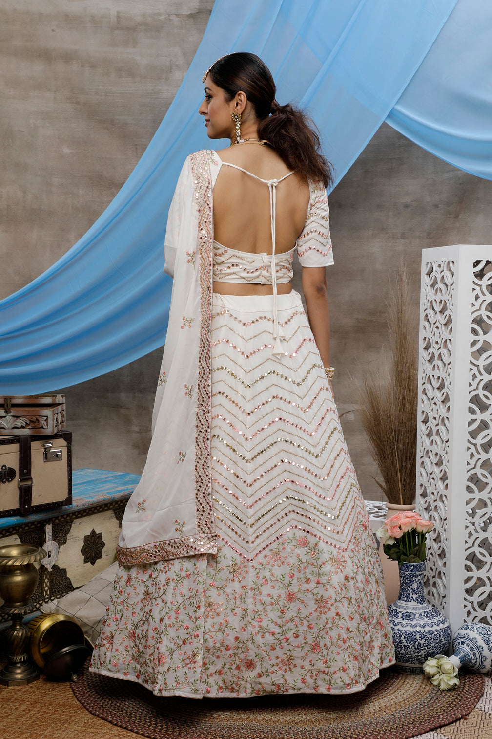 White Thread, Sequence And Gota Patti Embroidered Georgette Semi Stitched Bridal Lehenga