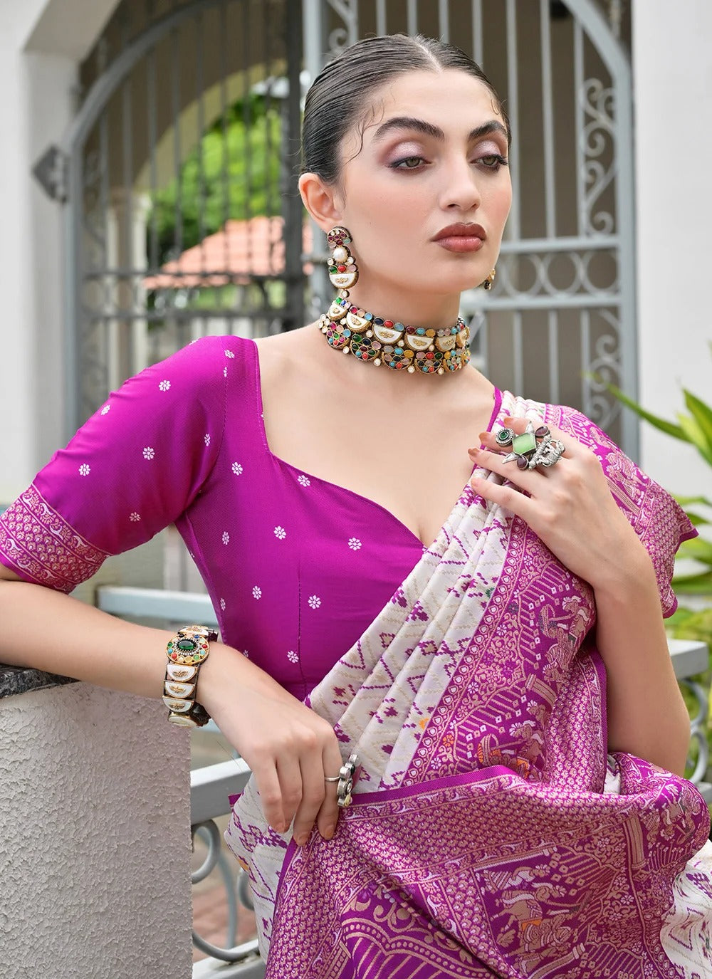 Magenta banarasi silk patola saree with ajrakh zari weaving pallu