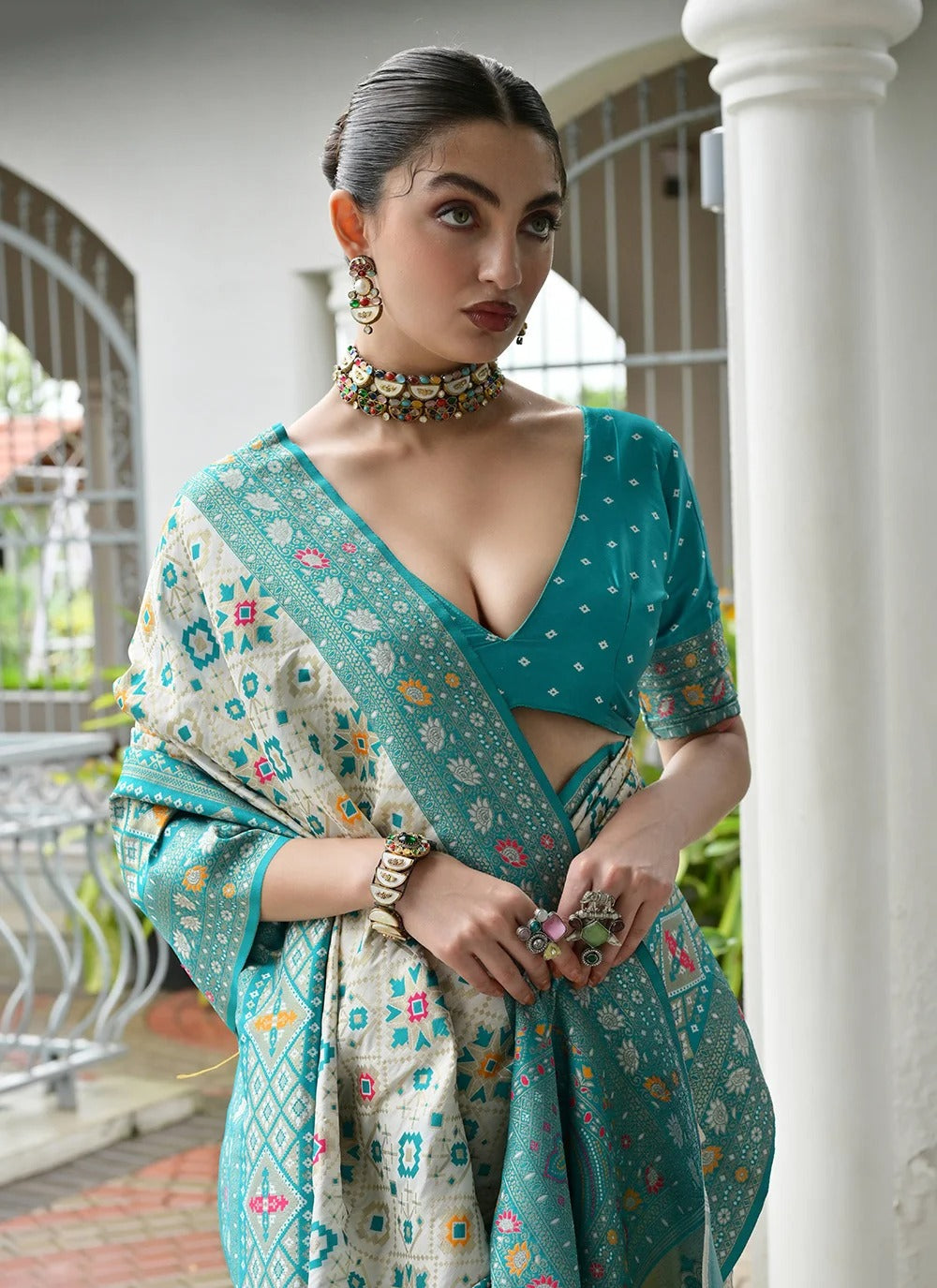 Sea green banarasi silk patola saree with ajrakh zari weaving pallu