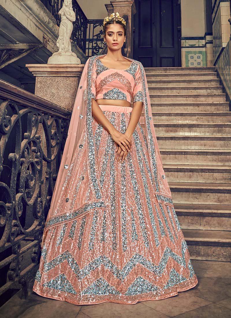 Attractive Soft Net Fabric Peach Color Sequins Work Lehenga Choli