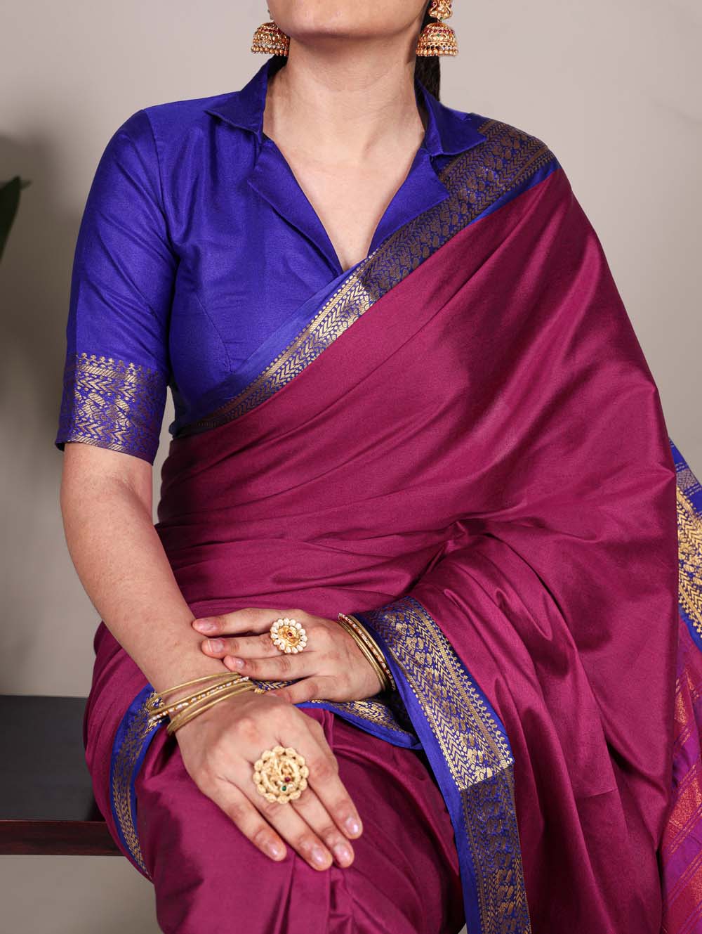 Pink aura silk saree with zari weaving and blue blouse