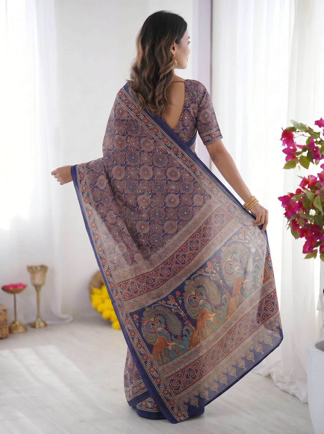 Royal blue modal silk saree with intricate ajrakh inspired geometric prints peacock artistic pallu traditional border