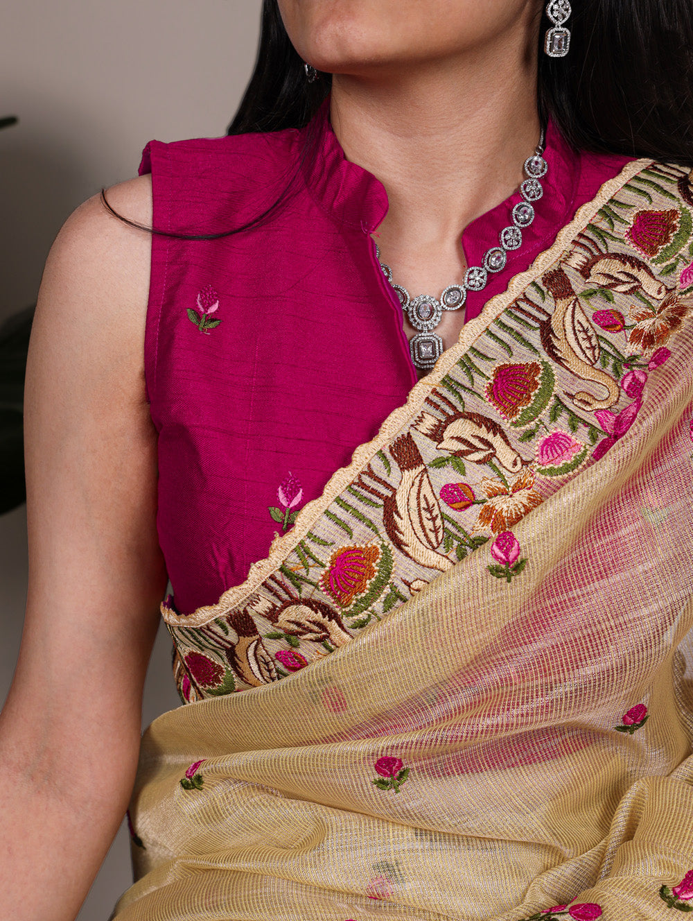 Gold zari kota tissue saree with floral thread embroidery and banglory blouse fabric