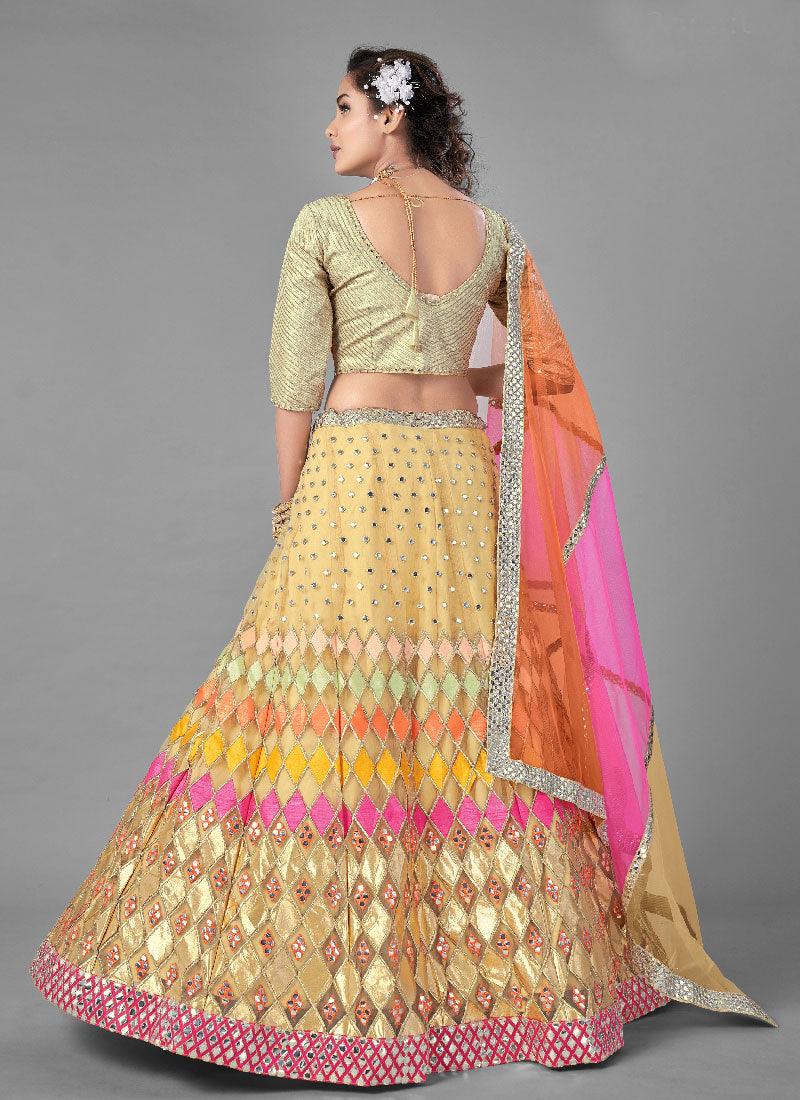 Beige Color Soft Net Base Flared Lehenga With Heavy Work Choli