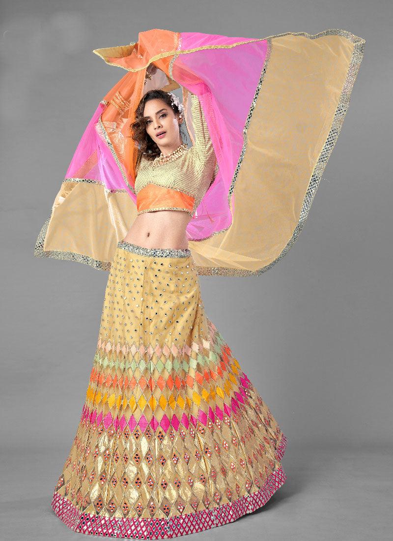 Beige Color Soft Net Base Flared Lehenga With Heavy Work Choli